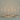 The Hall of Flame Antique Wedding Bundle features a minimalist dining table set for four with white plates, neutral napkins, silver cutlery, and six lit white taper candles in silver holders against a plain light background.