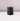 The Hall of Flame Black Votive Candle - 10 pack features natural wax candles with unlit wicks, perfect for pairing with crystal glass holders, and looks elegant on glossy white surfaces against a pale background.