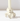 Hall of Flame Ivory Flower Candle Holder, a sculptural piece shaped like large textured leaves and crafted with 3D printing.