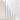 Five Hall of Flame Sky Blue Taper Candles XXL in shiny gold holders are arranged in a row against a white background.