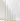 Five Hall of Flame Sky Blue Taper Candles XXL in shiny gold holders are arranged in a row against a white background.