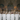The Hall of Flame Wedding Package sits on top of an elegant table display, creating an easy DIY wedding candle bundle for romantic table centrepieces.