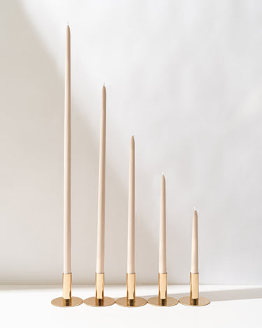 sand yellow taper candles