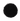 A pile of Hall of Flame's Sandwax Candle Refill 700g forms a circular shape on a white background, resembling small, round seeds often seen in candle making.