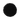 A pile of Hall of Flame's Sandwax Candle Refill 700g forms a circular shape on a white background, resembling small, round seeds often seen in candle making.