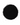 A pile of fine, black Hall of Flame Sandwax Candle Refill wax granules is spread in a circular shape on a white background.