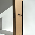 Extra-long black candle beside a wholesale tall box – ideal for weddings or bulk buy candles in Australia.