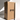 A tall, rectangular Hall of Flame Bulk Candles | Wholesale by-the-box packaging with THIS WAY UP arrows stands upright as a long black taper wedding candle leans against it, casting a shadow on the light background.