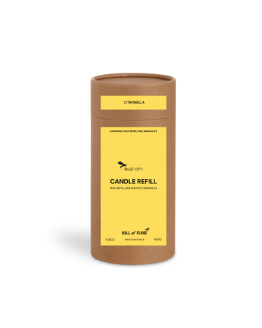 A cylindrical brown cardboard container labeled "The Bug-off! series | SANDWAX Scented Candle Refill" by Hall of Flame with citronella scent. The yellow label shows a black mosquito graphic and product details in black text.