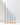 Four Hall of Flame Hydrangea Blue Cathedral Candles XXL, made from natural wax and varying in height, are displayed in gold holders and arranged from tallest to shortest against a plain white background.