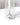The Hall of Flame Short | Antique Silver Holder, crafted from alloy metal, features a white candle inside a tall, clear glass hurricane lamp and casts a shadow to the right on a white surface.