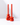 The Hall of Flame Scented Heirloom Tomato Stacker Duo (625g) features two orange-red handcrafted candles, each on a trio of pumpkin-shaped holders, elegantly set on a glossy white surface with soft shadows in the background.