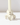 Hall of Flame Ivory Flower Candle Holder, a sculptural piece shaped like large textured leaves and crafted with 3D printing.