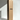 Extra-long beige candle beside a wholesale tall box – ideal for weddings or bulk buy candles in Australia.