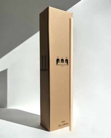 Extra-long beige candle beside a wholesale tall box – ideal for weddings or bulk buy candles in Australia.