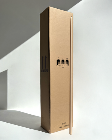 Extra-long Beige candle beside a wholesale tall box – ideal for weddings or bulk buy candles in Australia.