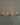 The Hall of Flame Floating Tealight Wedding Bundle adds a warm, soft glow to a minimal dining table set for three, with glass vessels and lit candles—an elegant wedding centrepiece for any plain background.