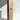 Extra-long White candle beside a wholesale tall box – ideal for weddings or bulk buy candles in Australia.