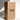 A tall beige taper from Hall of Flame rests against a large brown box labeled Bulk Candles | Wholesale by-the-box, featuring THIS WAY UP arrows—ideal for anyone sourcing wholesale candles in Australia.